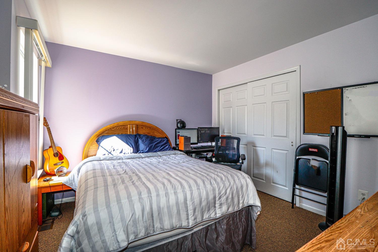 8 Prestwick Way Edison, NJ 08820 - Photo 20 of 27 a bedroom with a bed and dresser