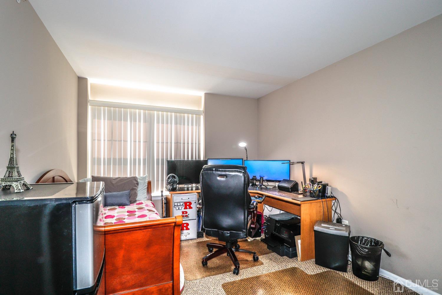 8 Prestwick Way Edison, NJ 08820 - Photo 21 of 27 a view of a workspace with furniture and a window