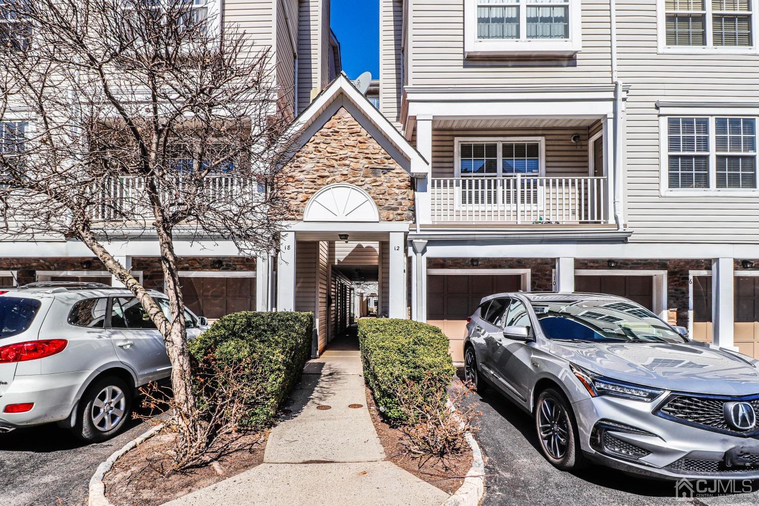 8 Prestwick Way Edison, NJ 08820 - Photo 26 of 27 a view of a car in front of a house