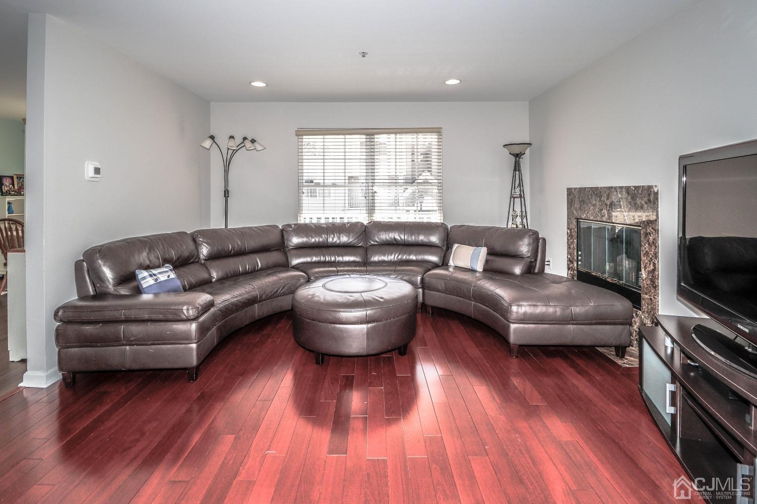 8 Prestwick Way Edison, NJ 08820 - Photo 3 of 27 a living room with furniture and a flat screen tv