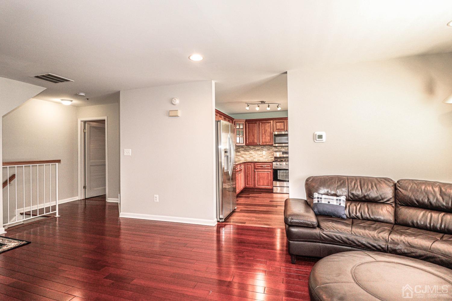 8 Prestwick Way Edison, NJ 08820 - Photo 5 of 27 a living room with furniture and a wooden floor