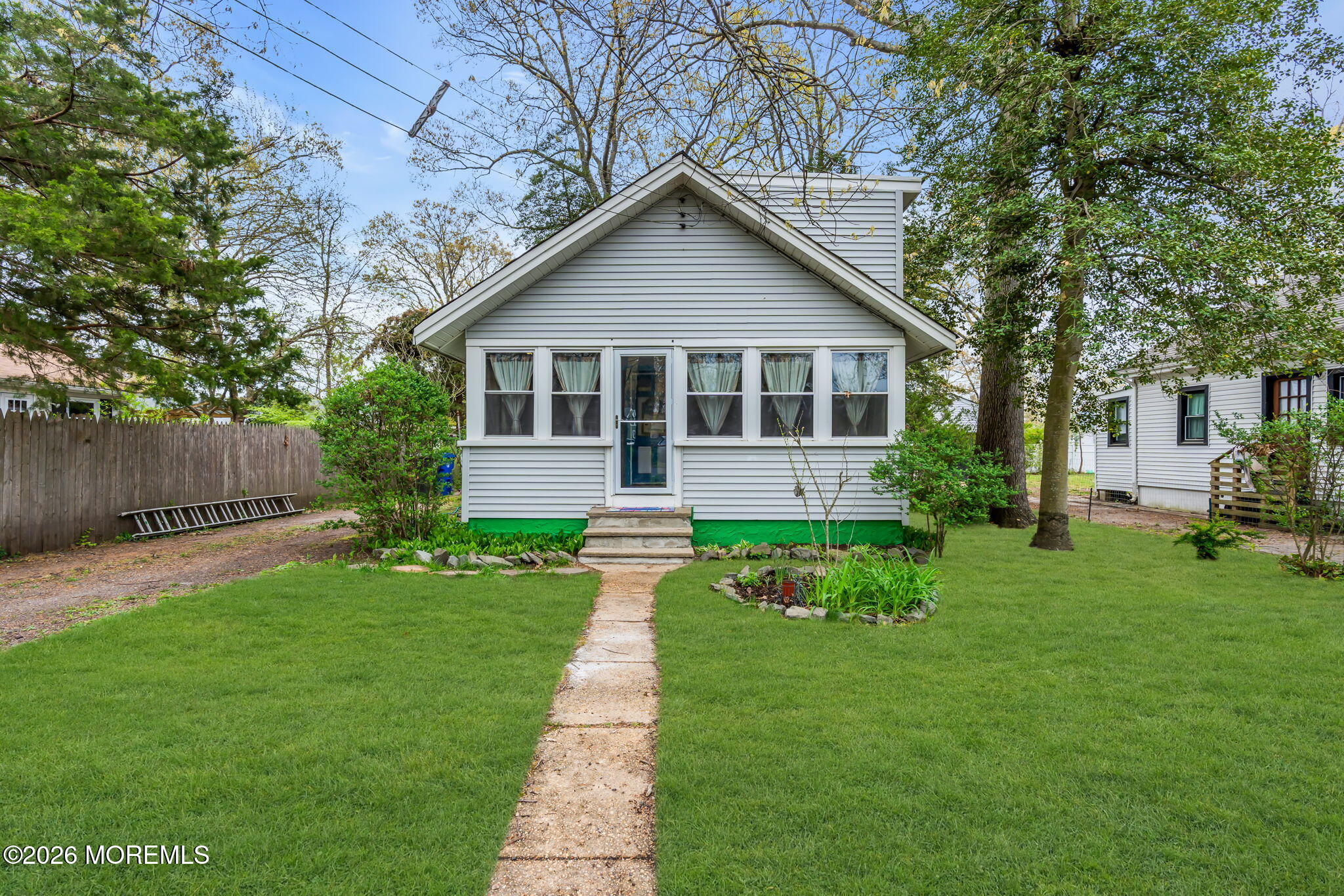 109 Martin Road Toms River, NJ 08753 - Photo 4 of 34 a view of a house with a yard and potted plants