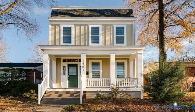front view of a house with a small yard