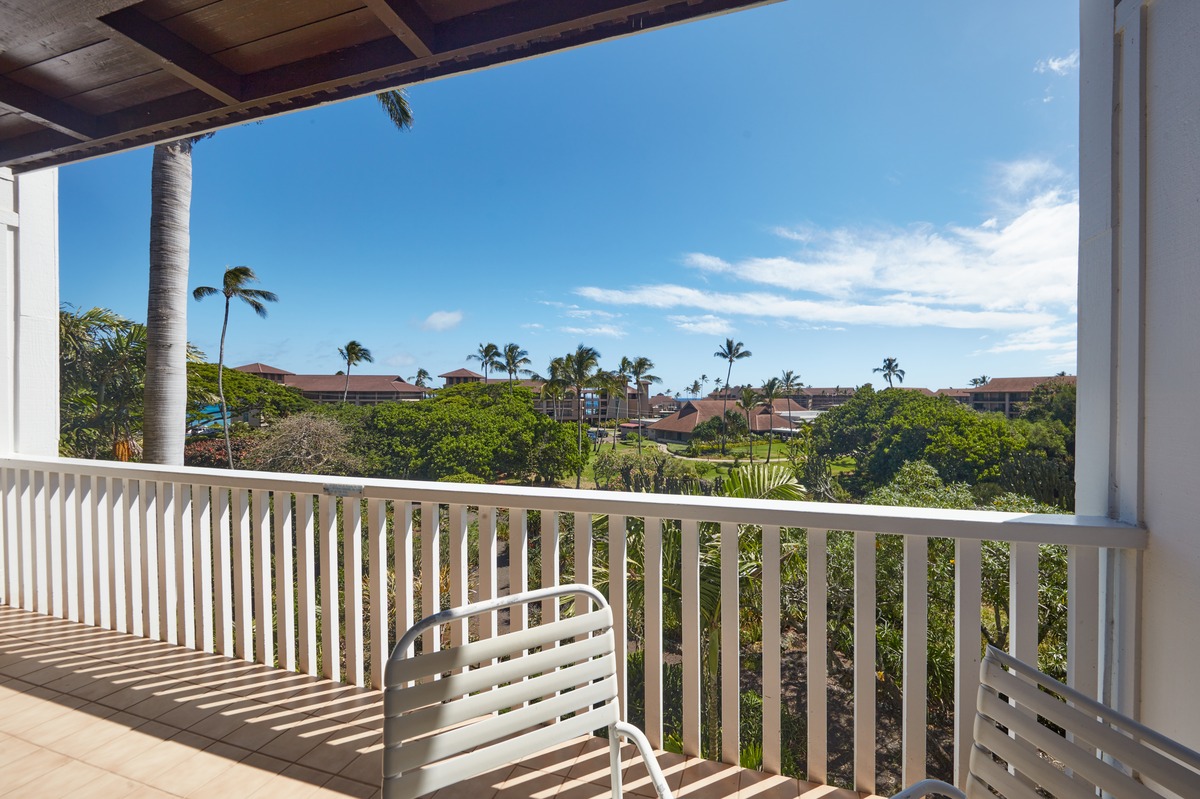 2253 Poipu Road, Unit 311 Koloa, HI 96756 - Photo 11 of 19 a view of a balcony with wooden fence