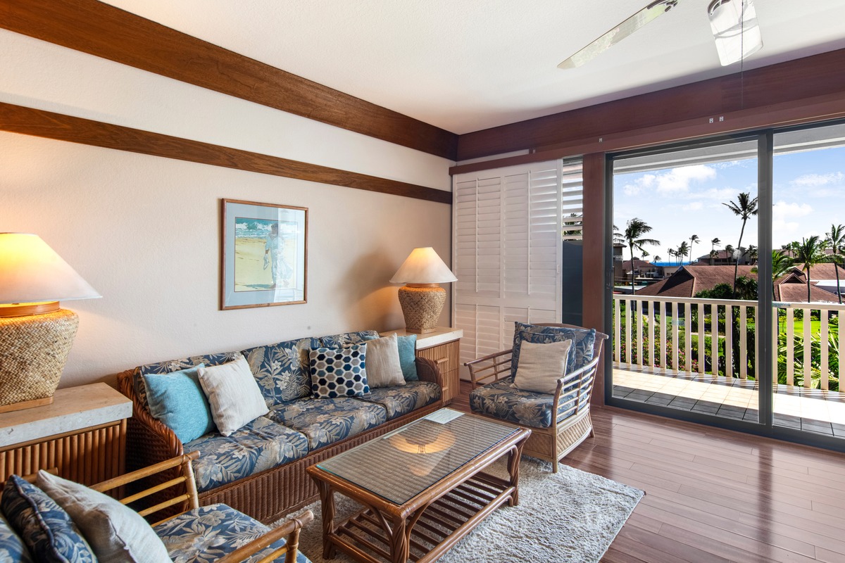 2253 Poipu Road, Unit 311 Koloa, HI 96756 - Photo 5 of 19 a living room with furniture and a floor to ceiling window