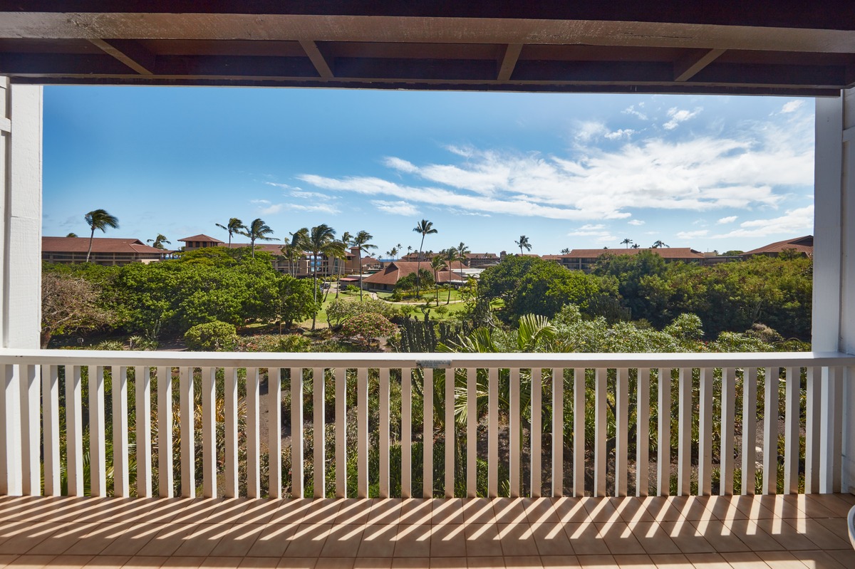 2253 Poipu Road, Unit 311 Koloa, HI 96756 - Photo 6 of 19 a view of a balcony with wooden fence