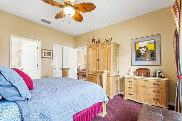 a bathroom with a double vanity sink mirror and