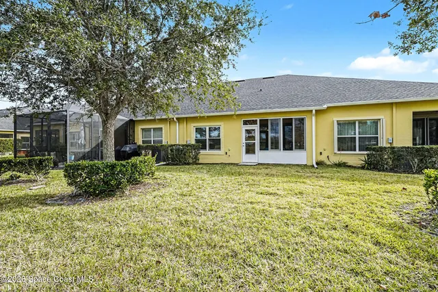 a view of a garden with an outdoor space