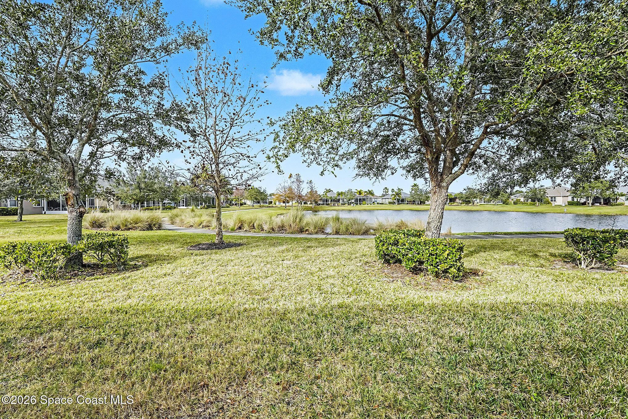 3670 Funston Circle Melbourne, FL 32940 - Photo 27 of 38 Back Yard & Pond