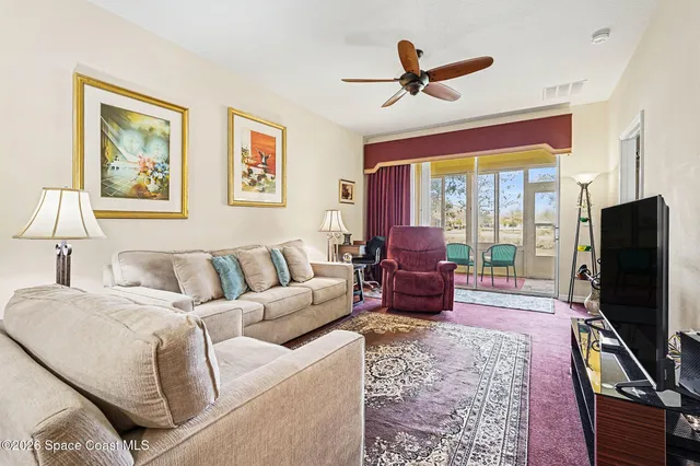 a view of a livingroom with furniture