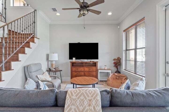 1900 Baytowne Loop Miramar Beach, FL 32550 - Photo 16 of 44 a living room with furniture and a flat screen tv