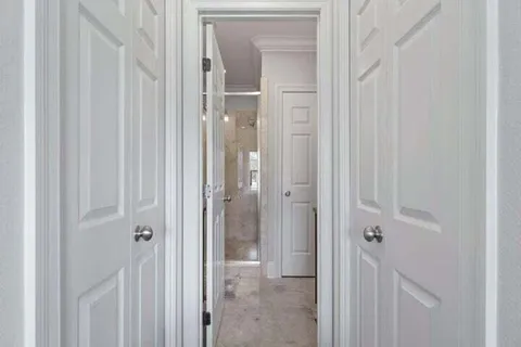 a view of a bathroom with a glass door