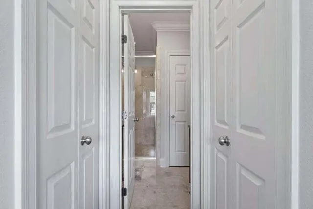 a view of a bathroom with a glass door