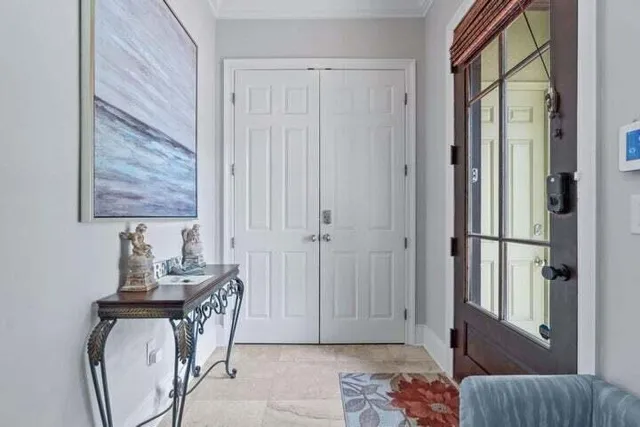 a bedroom with furniture and a window