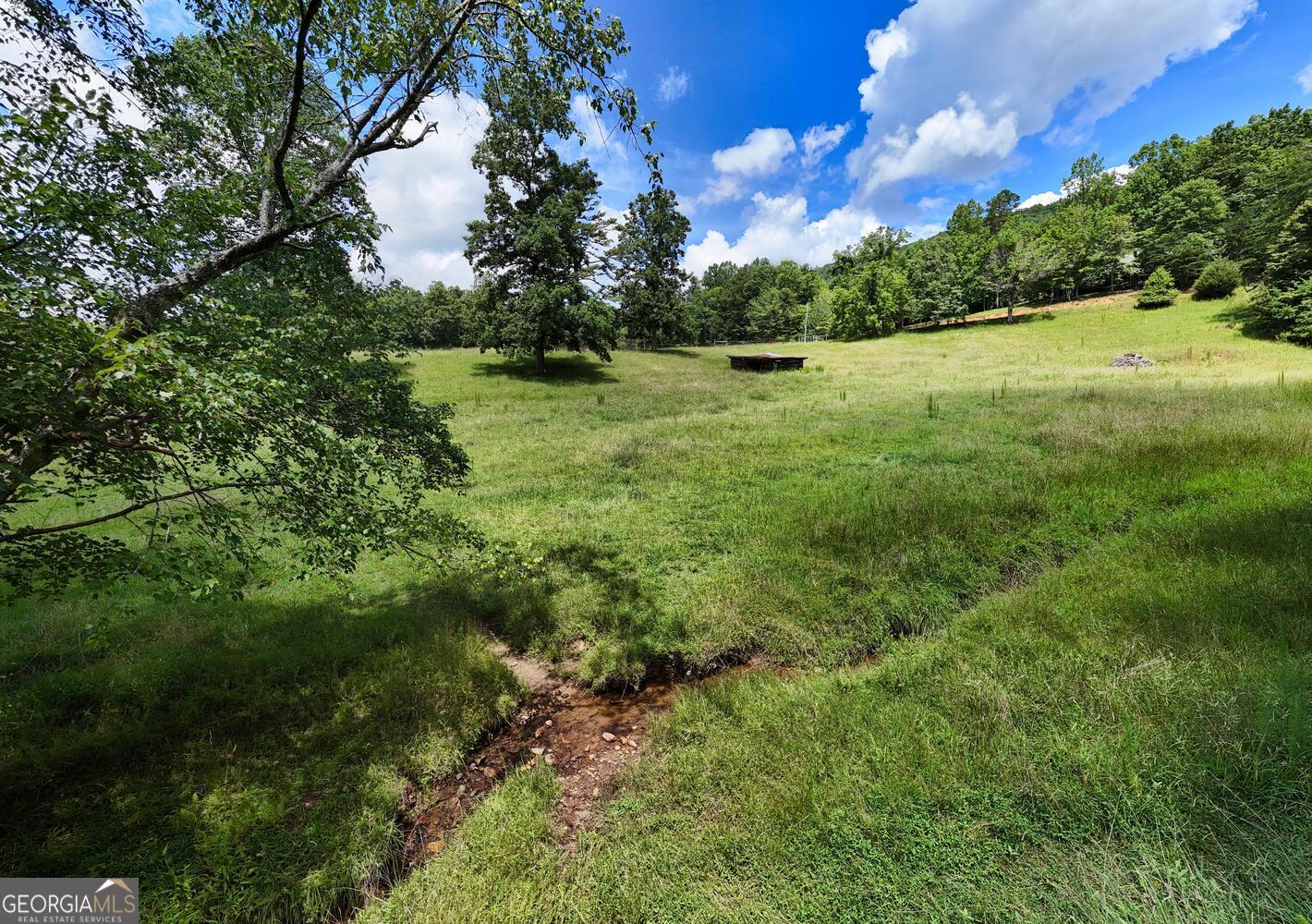 3291 Moccasin Creek Road Murphy, NC 28906 - Photo 12 of 78 a view of outdoor space with deck and yard