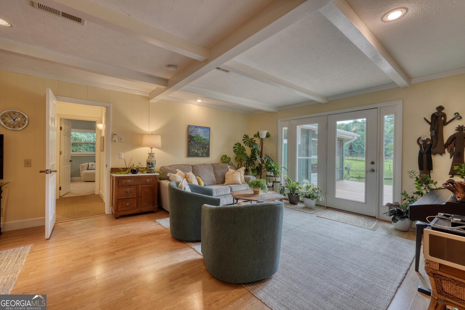3291 Moccasin Creek Road Murphy, NC 28906 - Photo 18 of 78 a living room with furniture and a flat screen tv