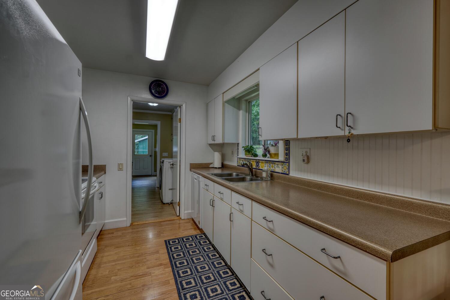 3291 Moccasin Creek Road Murphy, NC 28906 - Photo 24 of 78 a kitchen with a sink and cabinets
