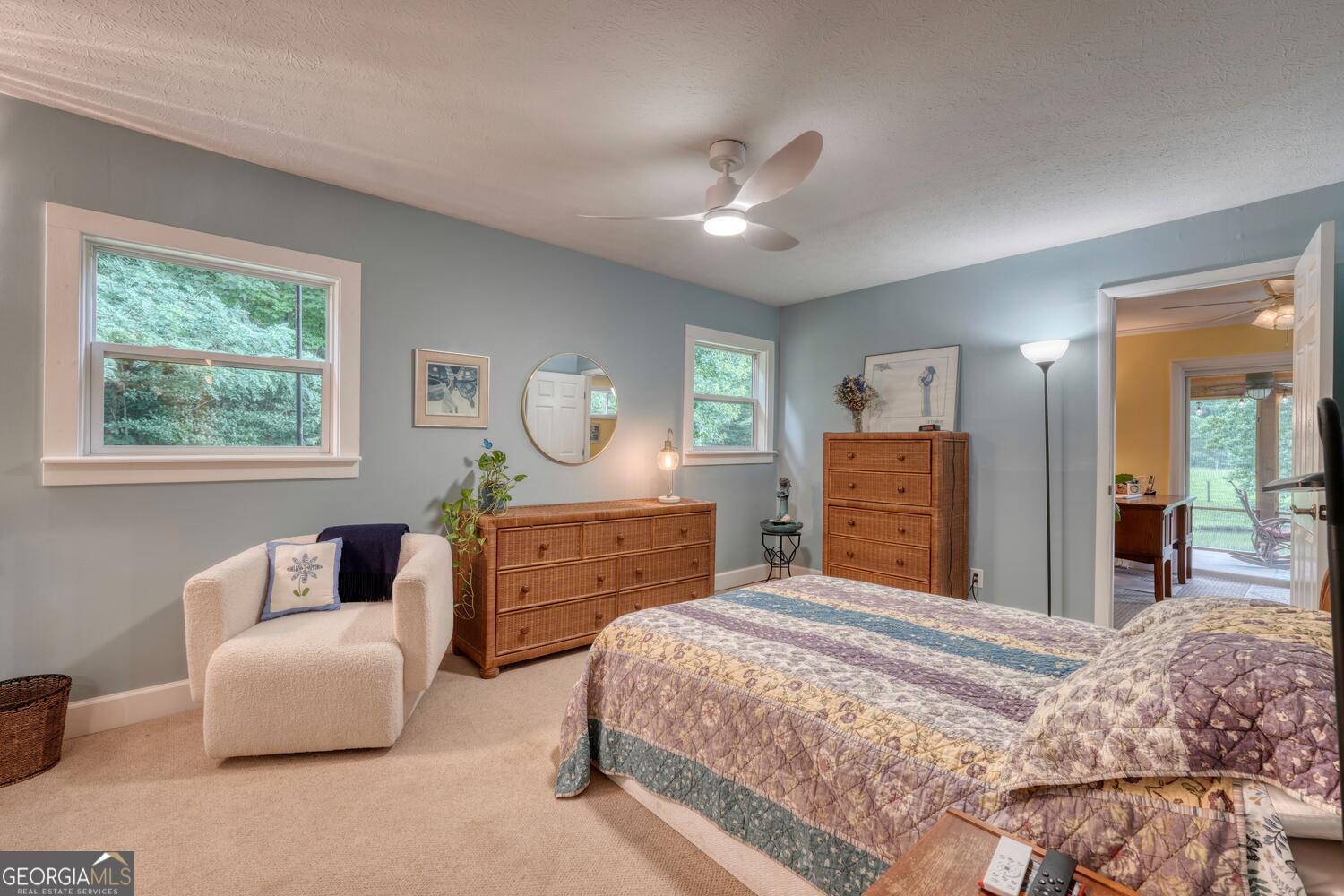 3291 Moccasin Creek Road Murphy, NC 28906 - Photo 29 of 78 a bedroom with a bed and a dresser