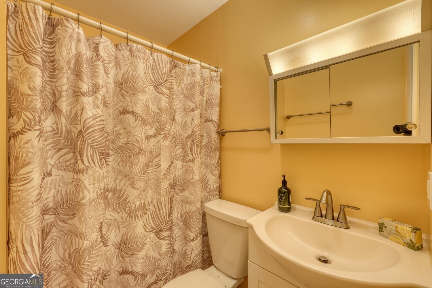 3291 Moccasin Creek Road Murphy, NC 28906 - Photo 41 of 78 a bathroom with a sink and a toilet
