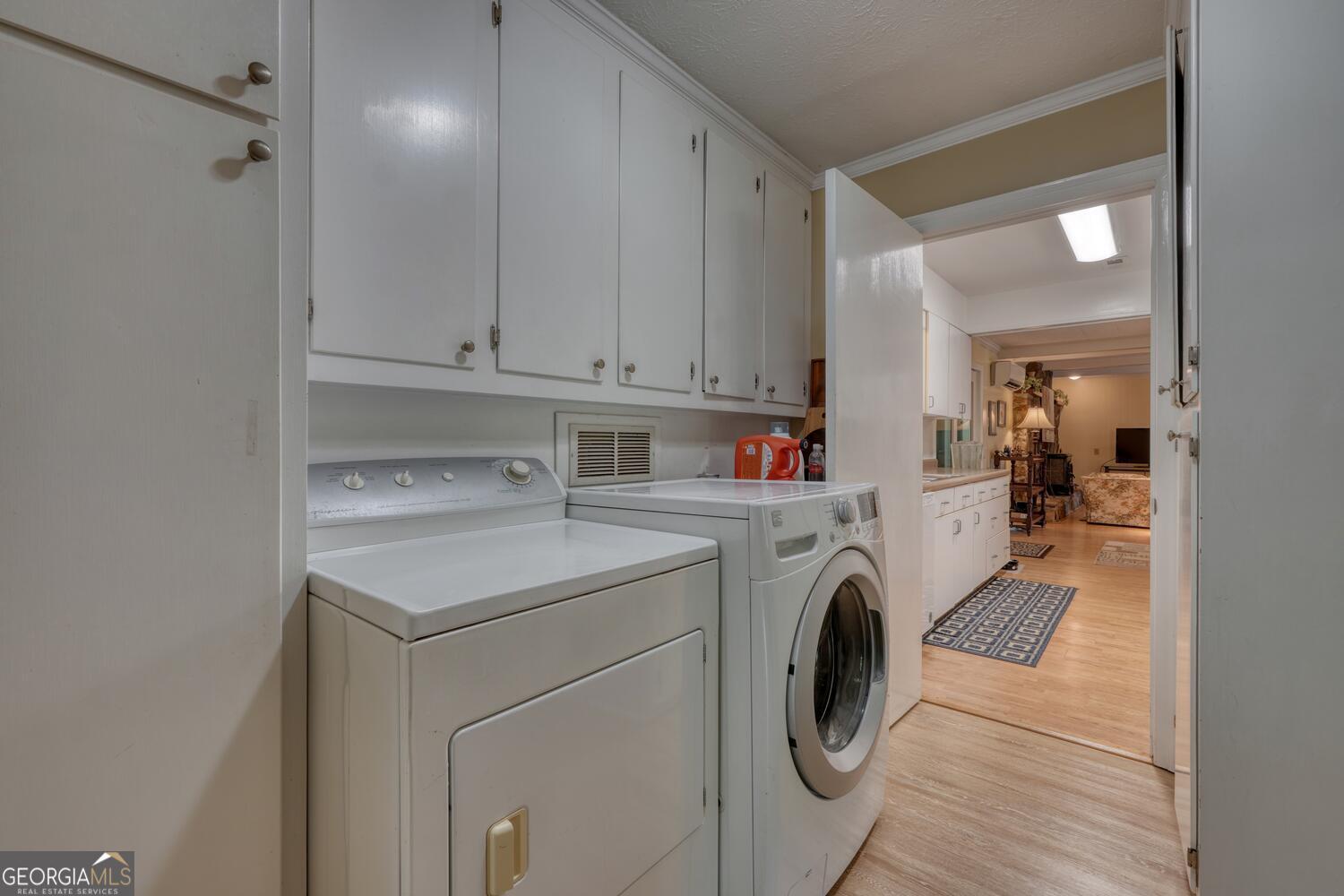 3291 Moccasin Creek Road Murphy, NC 28906 - Photo 42 of 78 a utility room with sink dryer and washer