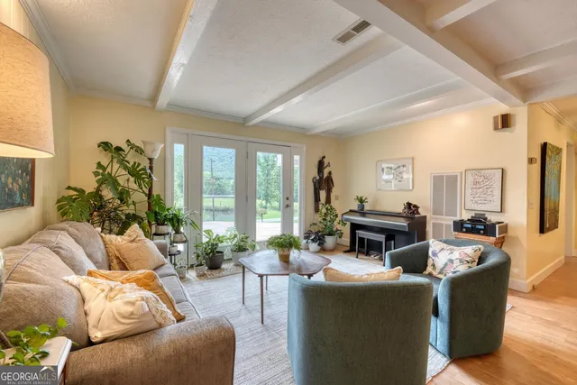 a view of a swimming pool with a yard