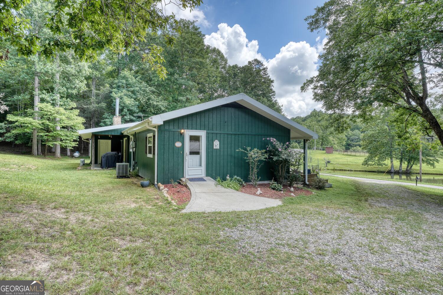 3291 Moccasin Creek Road Murphy, NC 28906 - Photo 62 of 78 a view of a house with a yard