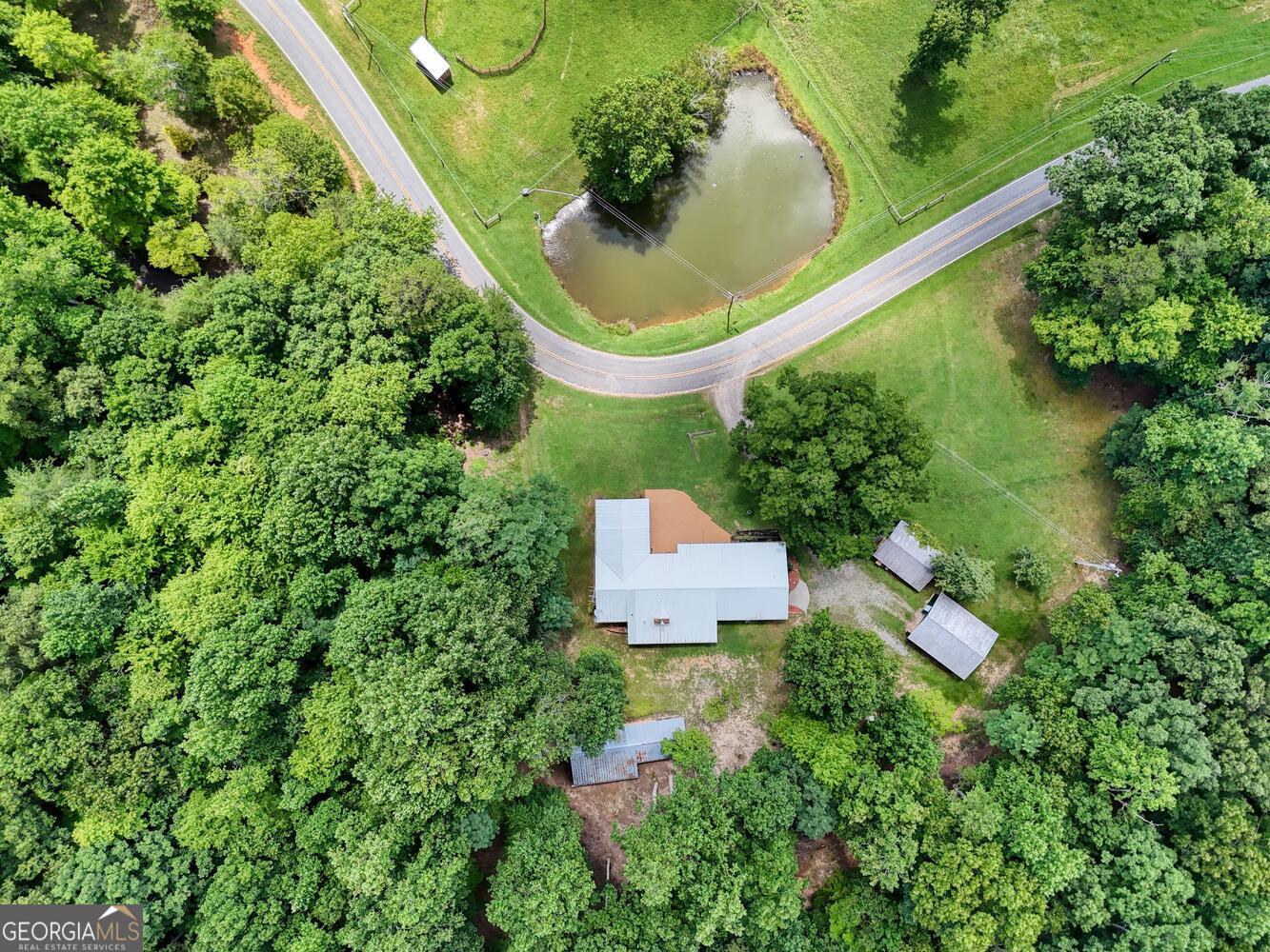 3291 Moccasin Creek Road Murphy, NC 28906 - Photo 72 of 78 an aerial view of a house with a yard and trees all around