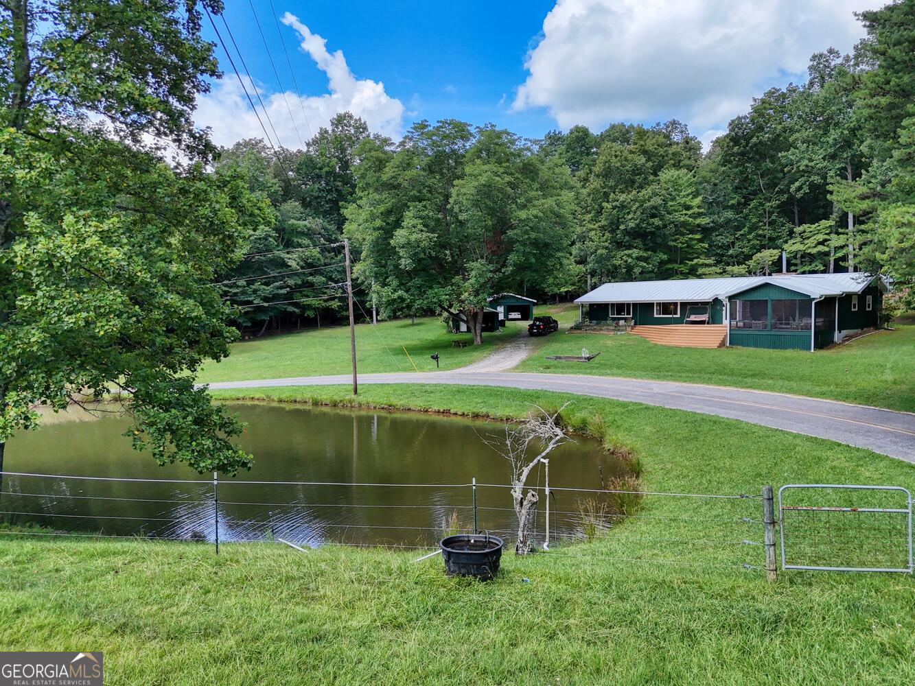 3291 Moccasin Creek Road Murphy, NC 28906 - Photo 10 of 78 a view of a swimming pool with a yard