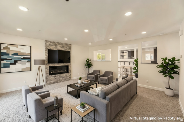 4658 Box Elder Street Salt Lake City, UT 84107 - Photo 3 of 17 Spacious living area featuring recessed lighting, a stone-accented fireplace, and carpeting