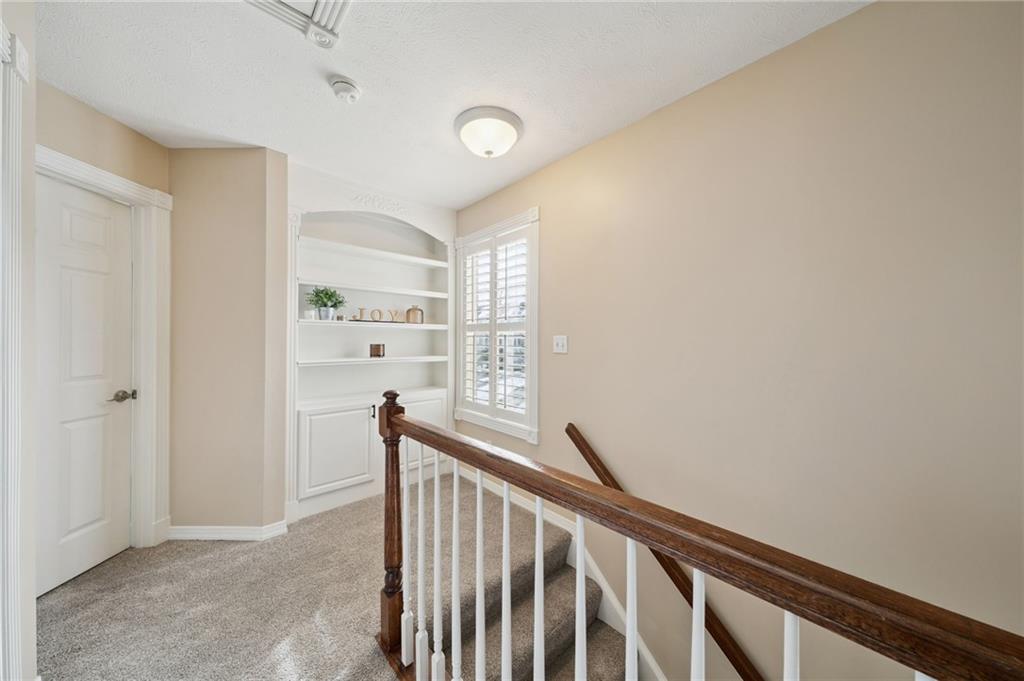 404 Beech Street Gibsonia, PA 15044 - Photo 13 of 32 a view of a hallway with windows