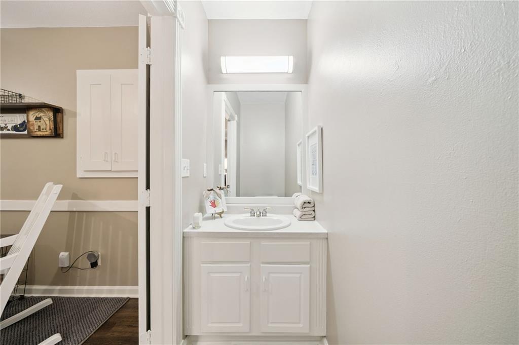 404 Beech Street Gibsonia, PA 15044 - Photo 27 of 32 a bathroom with a sink and a mirror