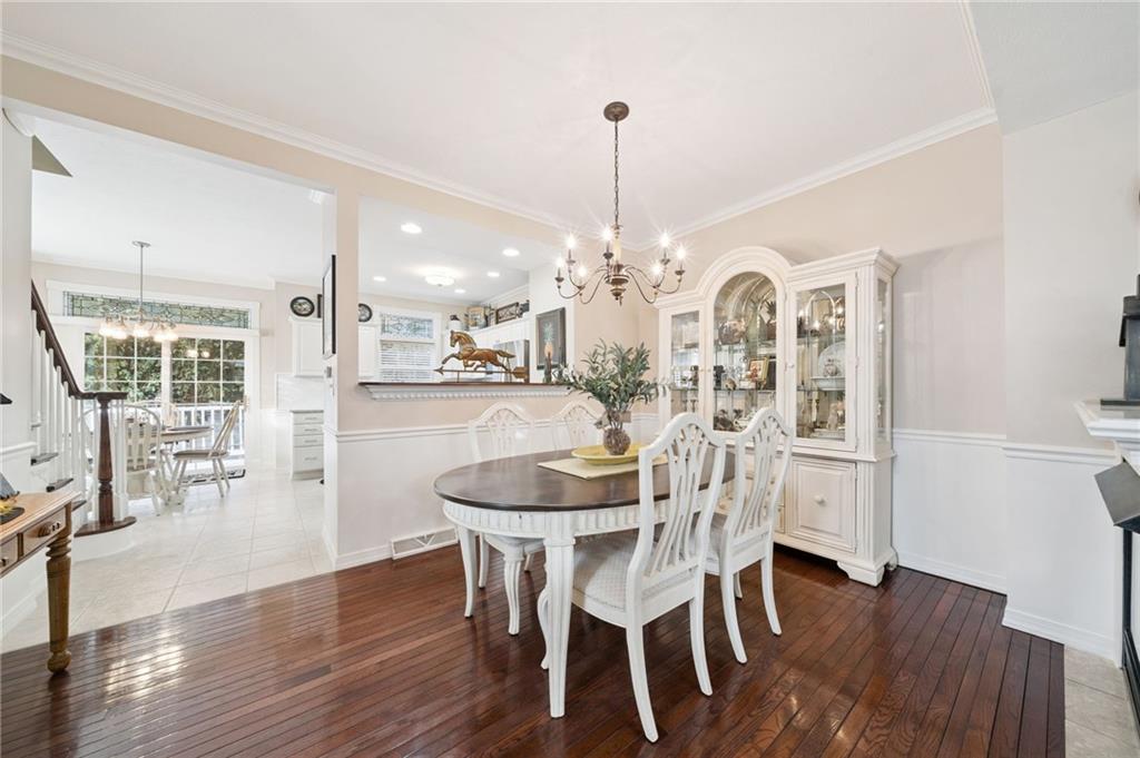 404 Beech Street Gibsonia, PA 15044 - Photo 6 of 32 a view of a dining room with furniture window and wooden floor
