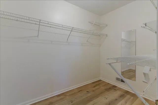 a view of a room with racks on the wall