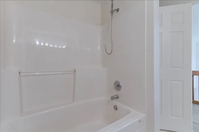 a bathroom with a bathtub