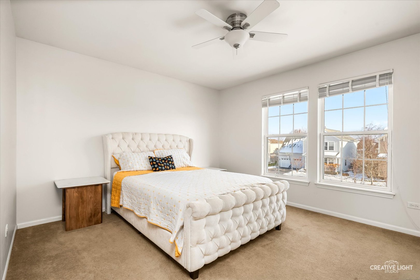 2455 Montclair Lane Montgomery, IL 60538 - Photo 12 of 22 a bedroom with a large bed and a window