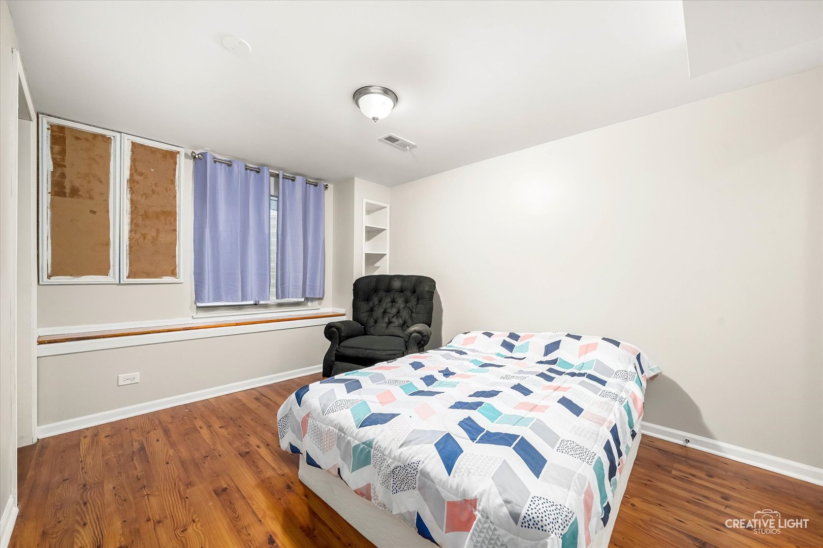 2455 Montclair Lane Montgomery, IL 60538 - Photo 18 of 22 a bedroom with a bed and a window