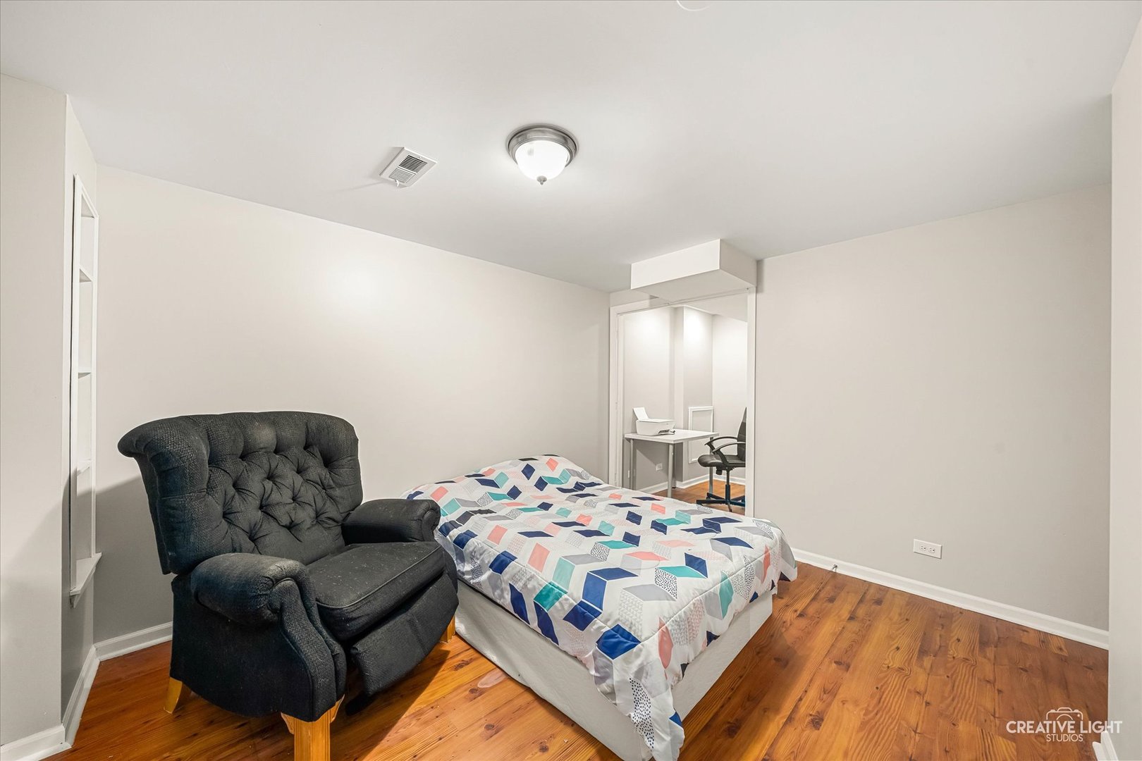 2455 Montclair Lane Montgomery, IL 60538 - Photo 19 of 22 a bedroom with a bed and a couch