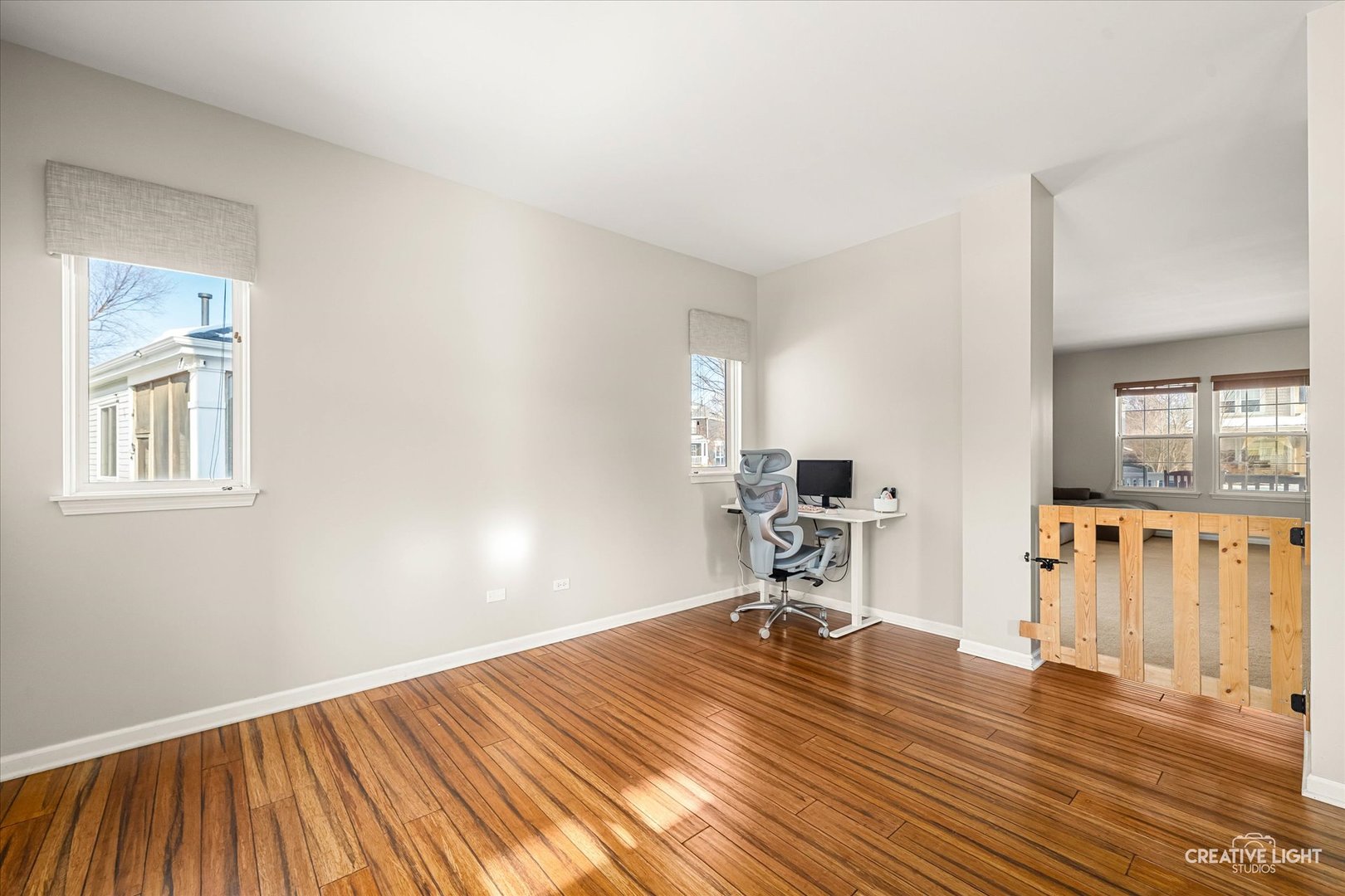 2455 Montclair Lane Montgomery, IL 60538 - Photo 4 of 22 a room with a bed and a chair