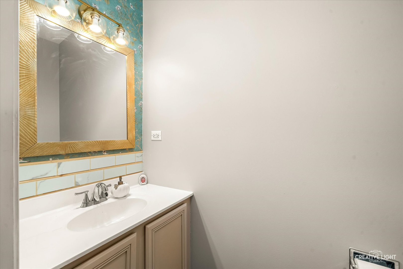 2455 Montclair Lane Montgomery, IL 60538 - Photo 10 of 22 a bathroom with a sink and a mirror