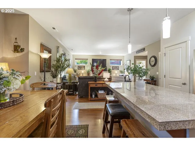 a view of a living room and dining room