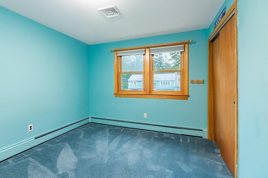 11 Augustus Road Lexington, MA 02421 - Photo 15 of 31 an empty room with a window