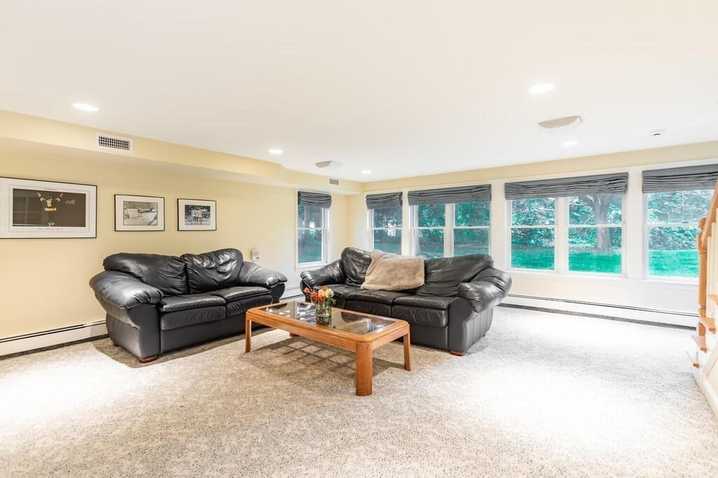 11 Augustus Road Lexington, MA 02421 - Photo 20 of 31 a living room with furniture and a large window