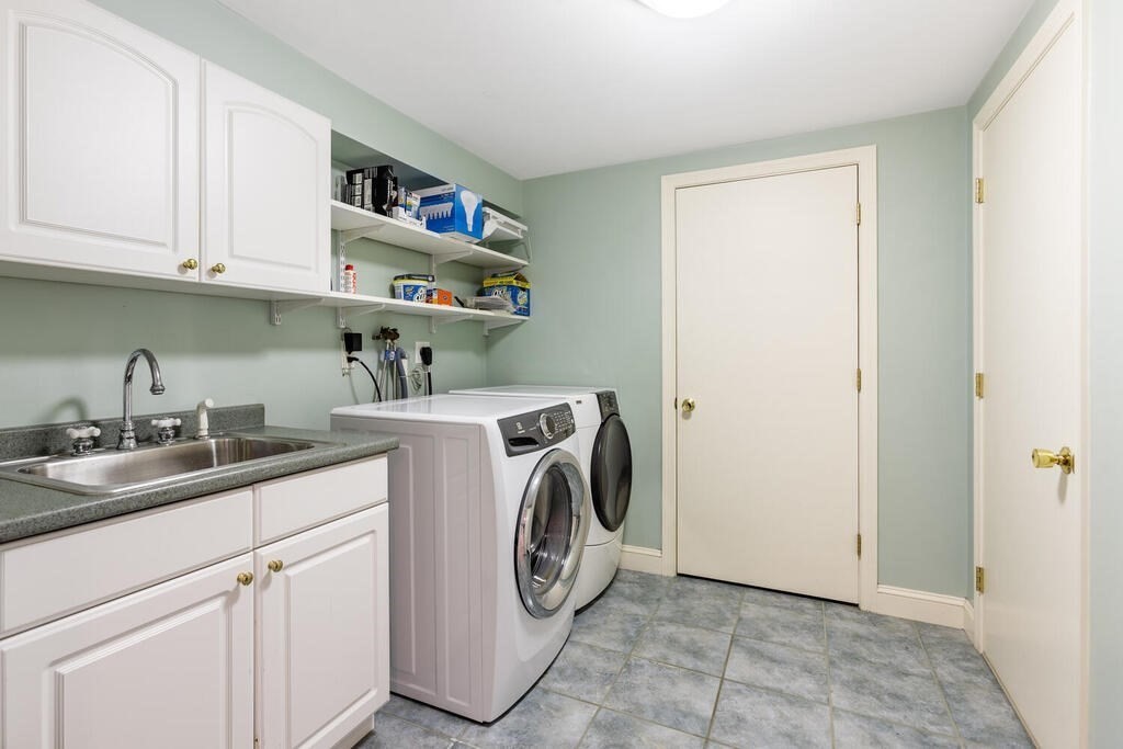 11 Augustus Road Lexington, MA 02421 - Photo 24 of 31 a utility room with sink dryer and washer