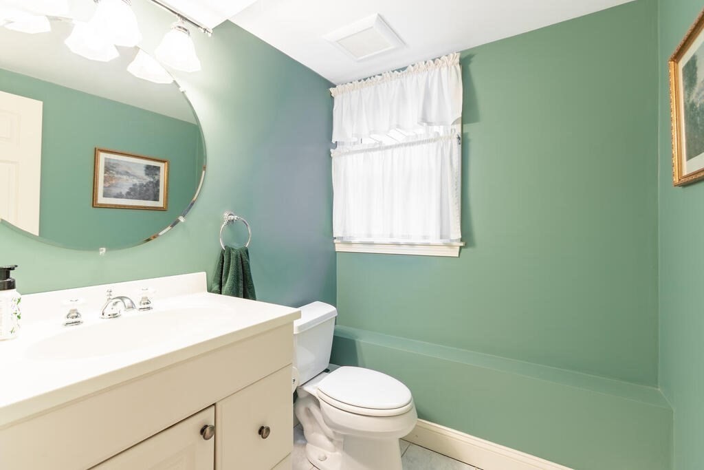 11 Augustus Road Lexington, MA 02421 - Photo 25 of 31 a bathroom with a sink a toilet and a window