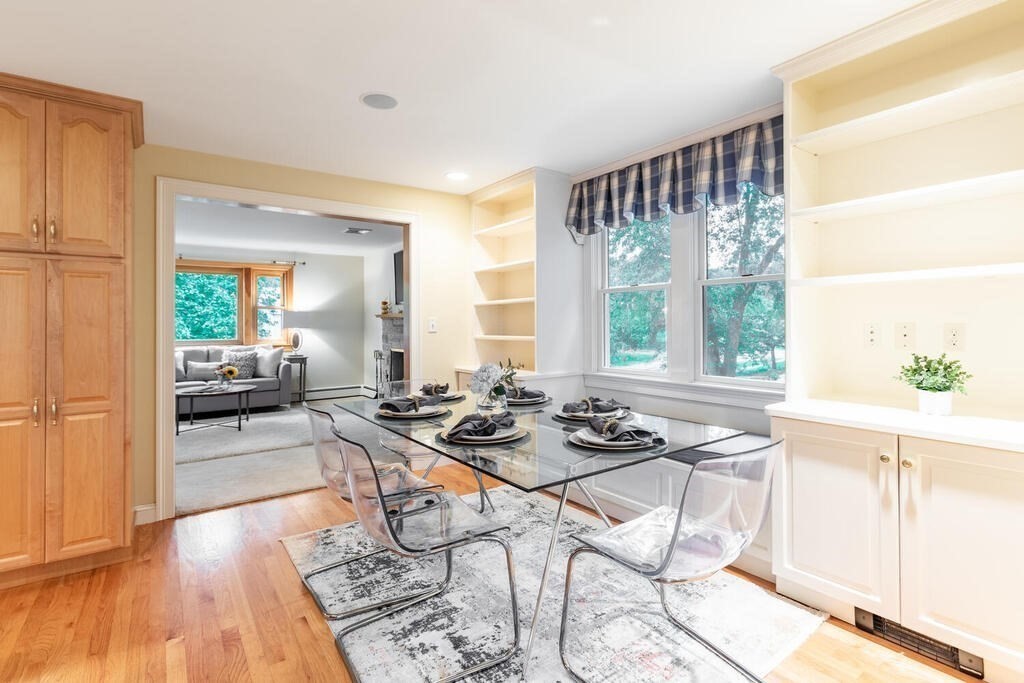 11 Augustus Road Lexington, MA 02421 - Photo 5 of 31 a view of a dining room with furniture window and outside view