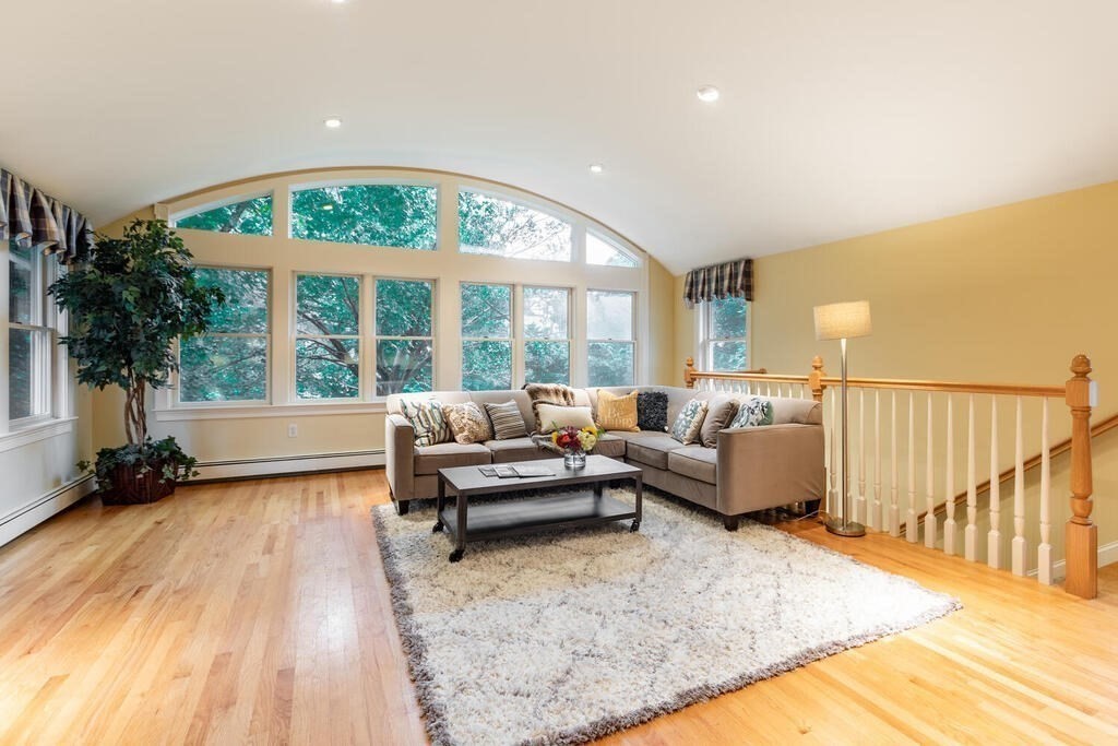 11 Augustus Road Lexington, MA 02421 - Photo 6 of 31 a living room with furniture and a large window