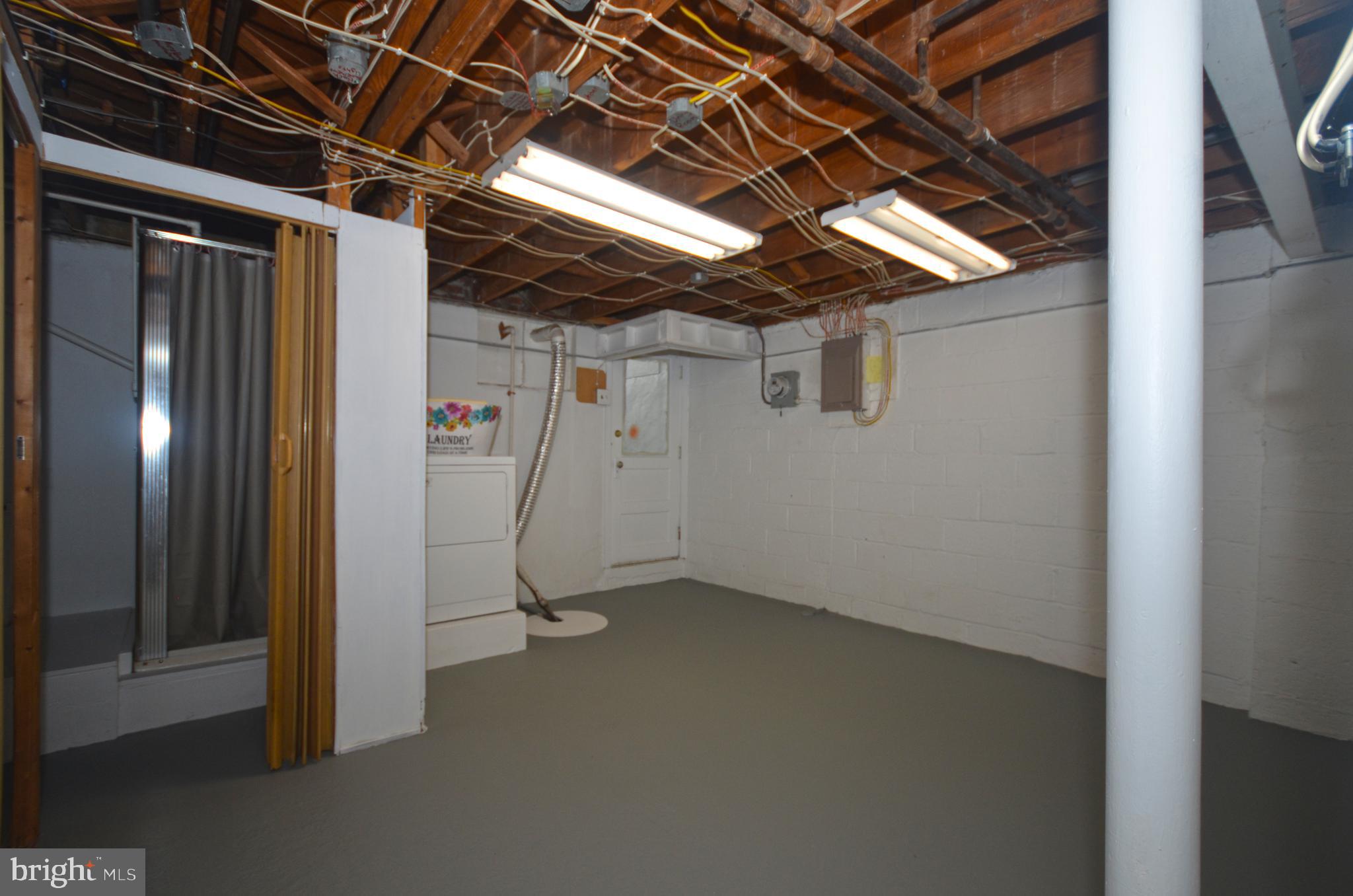 8508 Willow Oak Road Baltimore, MD 21234 - Photo 25 of 29 Storage/laundry area with bonus shower/flush