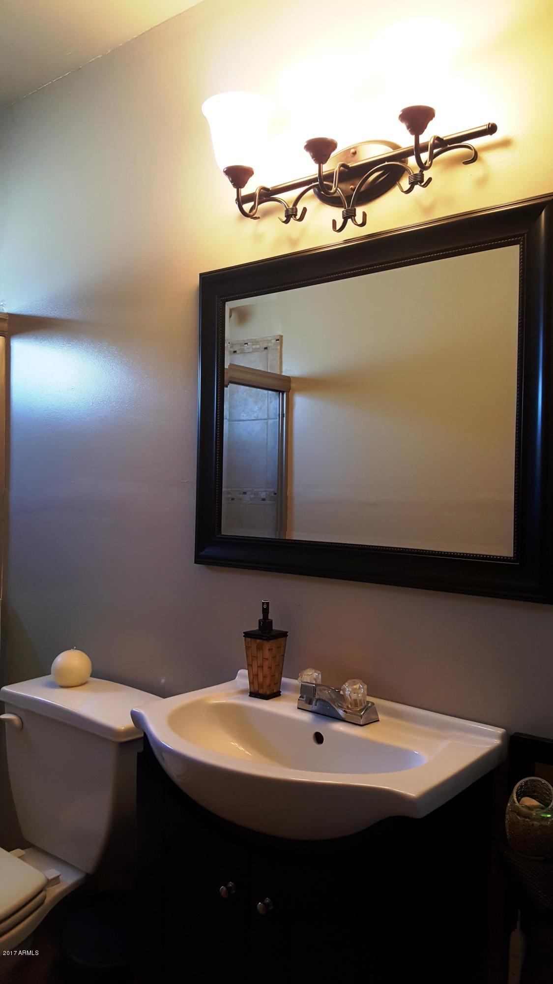 239 West Carson Road Phoenix, AZ 85041 - Photo 12 of 20 Guest Bath_W Carson Rd.