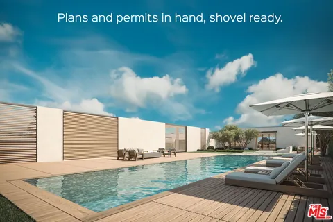 a view of a patio with furniture