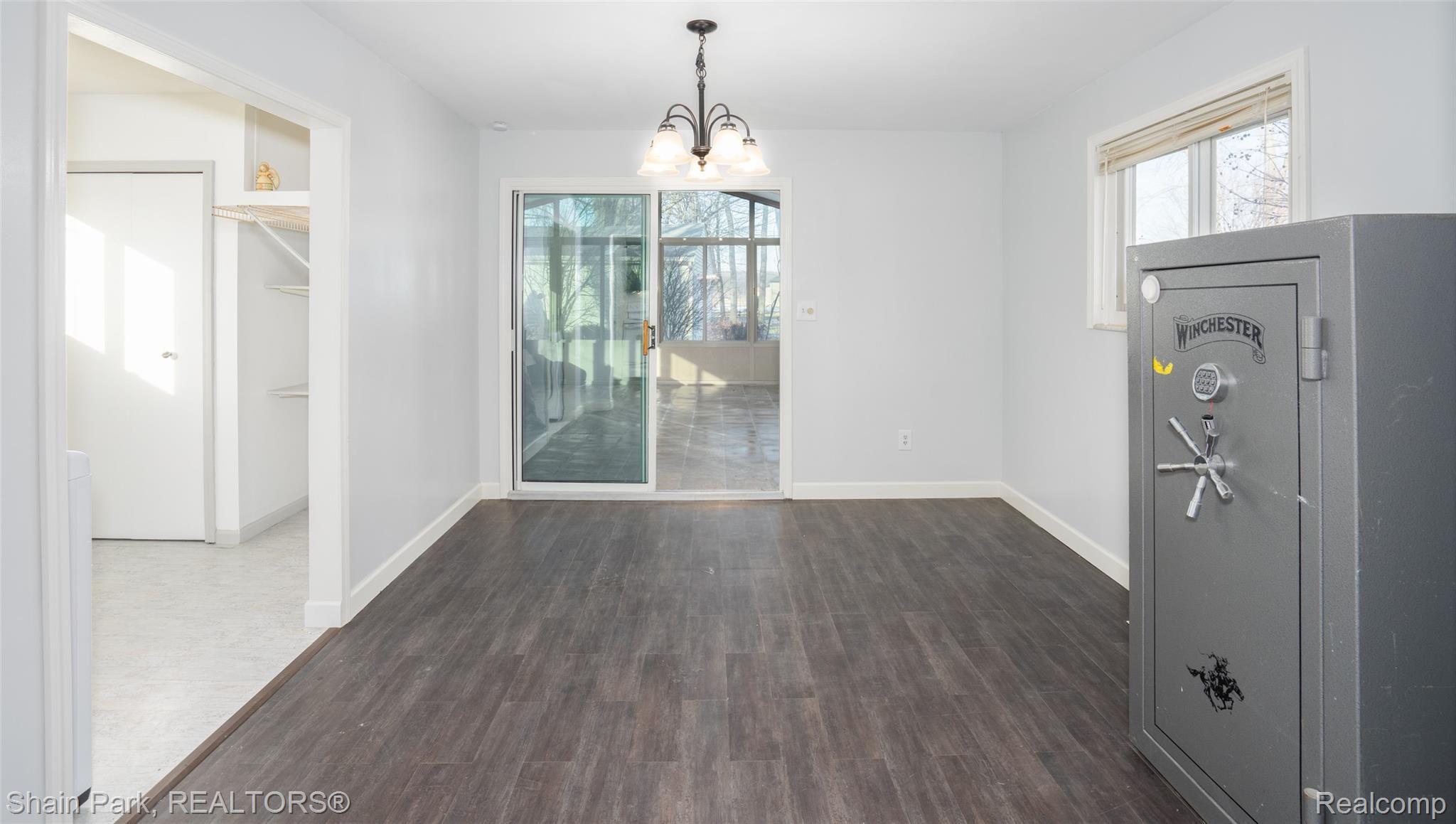 9370 Short Cut Road Fair Haven, MI 48023 - Photo 12 of 29 Dining Area to Sunroom